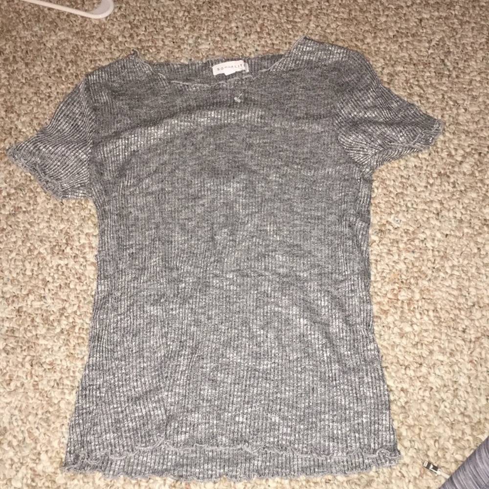 Tight short sleeve grey shirt